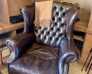 Pair of leather wing back chairs