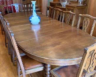 Antique Italian table (with 4 leaves) and 12 chairs, approx 12 ft by 46”