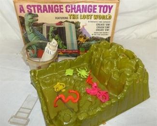 STRANGE CHANGE TOY W/ BOX