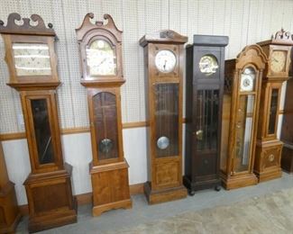GROUP PICTURE GRANDFATHER CLOCKS