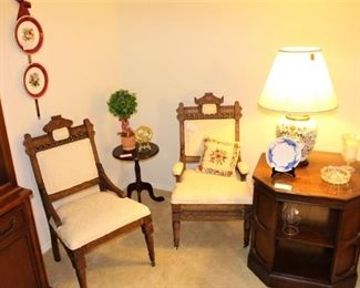Pair of Eastlake chairs shown with end table.