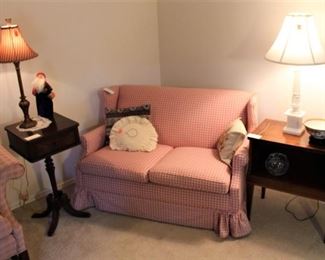 Pretty loveseat.  One of a pair.  Second love seat is shown in the master bedroom on the second floor.