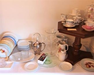 Lots of china, pretty tea cups and saucers and creamer, sugar sets.