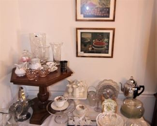 Beautiful tea cups and saucers, glassware, vases and wall art.