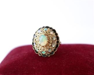 Opal and gold ladies ring