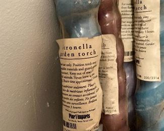 Candles on bamboo stalks about 3 feet high $ 4ea