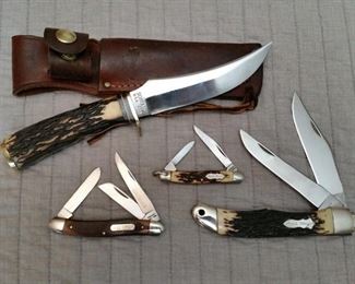 Shrade 498 hunting knife and three Shrade folding knives