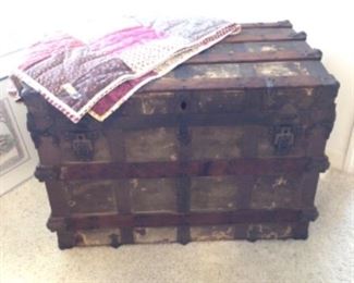 Antique trunk and small quilt