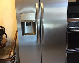 Frigidaire stainless refrigerator. Clean and in like new condition. 