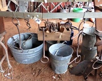 Galvanized buckets, horse bits