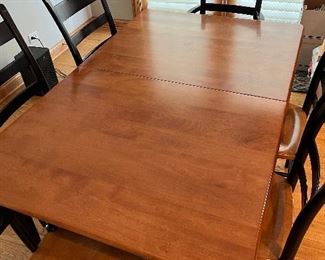 Nichols and Stone kitchen table with 4 side chairs and 2 captains chairs 38" x 60"