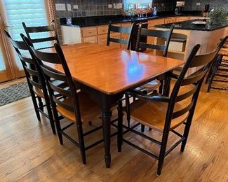 Nichols and Stone kitchen table with 4 side chairs and 2 captains chairs 38" x 60"
