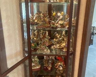 Andrea Sadek bird collection and curio cabinet 