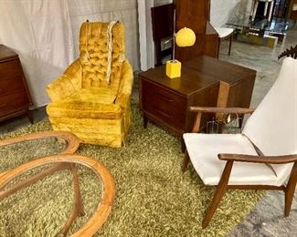 These gold velvet chairs are as comfortable as a cloud, and notice the yellow Sonneman lamp
