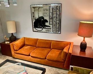 Burnt orange velvet sofa with cube end tables