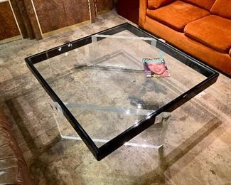 This coffee table has the thickest lucite slab base I've ever seen