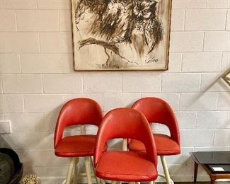 Cool 1950’s red barstools with a tiki vibe