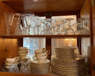 Crystal glasses and 10 places setting china
