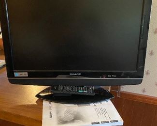 Sharp. 19' TV. with remote and manual