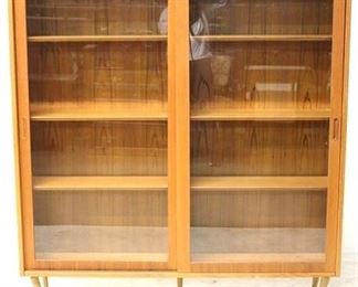 7058 - Hundevad Danish teak sliding door bookcase 58 1/4 x 54 1/2 x 12