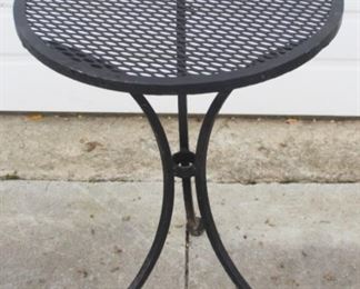 58 - Metal round table 23 1/2 x 17