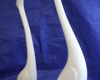 301 - Pair of Ceramic Swans, signed 17.5" tall & 15" tall
