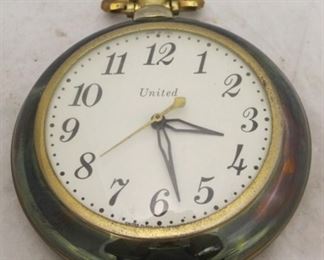 518 - United pocket watch design wall clock 8 x 10