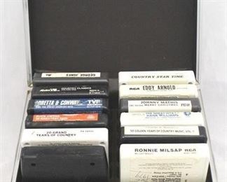537 - Case with 8 track tapes 9 1/2 x 6 x 7 1/2