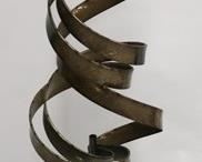 692 - Metal ribbon table sculpture 37" tall