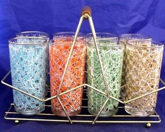 1021 - Vintage set of tumblers in rack 12 x 6 x 8 1/2