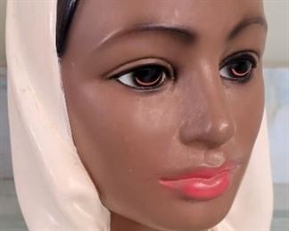 1605 - Polynesian lady head in white 8 1/2" tall