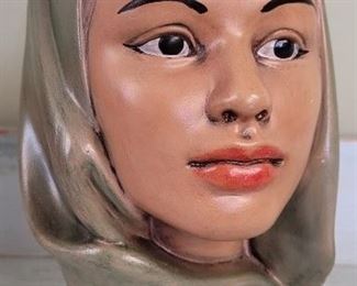 1606 - Polynesian lady head in green 9 1/2" tall