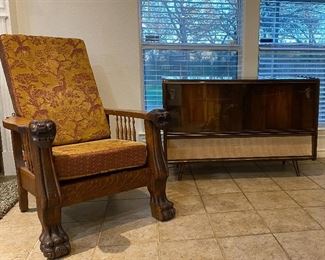 antique claw and lion  reclining chair , stereo cabinet  with record player 