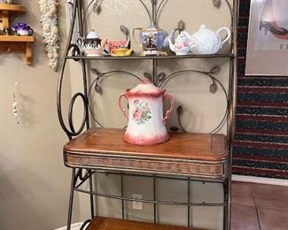 Metal, wood and glass Bakers Rack with woven wicker accents