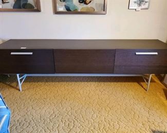 This fabulous piece has multiple uses. Most commonly as a sidebar. Almost 9feet wide it is great when entertaining and has plenty storage. Special design for storing China, Crystal and flatware/serving pieces