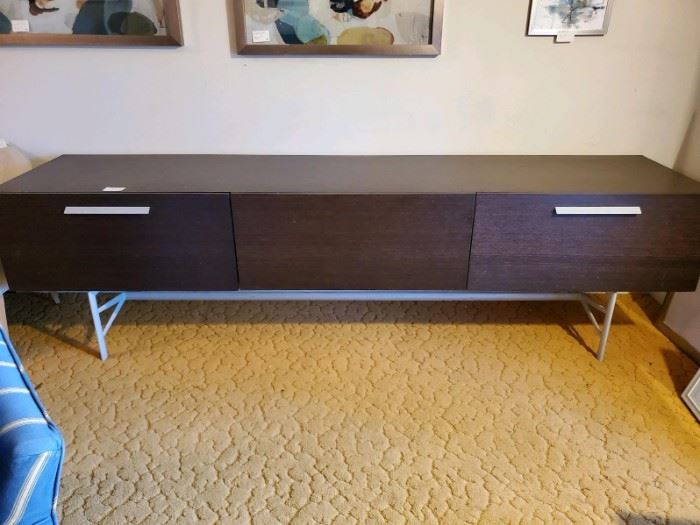 This fabulous piece has multiple uses. Most commonly as a sidebar. Almost 9feet wide it is great when entertaining and has plenty storage. Special design for storing China, Crystal and flatware/serving pieces