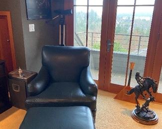 Hancock and Moore leather chair and ottoman  Chair is 33'w x 38"d x 34"h.  Ottoman is 27" x 21" x 16"h excellent condition.  $420