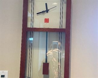 Modern design wall clock  adapted from a Frank Lloyd Wright design with Bulova Quartz clockworks. $240
