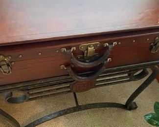 Leather suitcase styled trunk/box atop a metal base.  13"d x 25.5"w  x 27"h.  $120