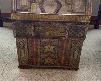 A decorative box hand painted 4"h x 19"w x 12.5"d. $60