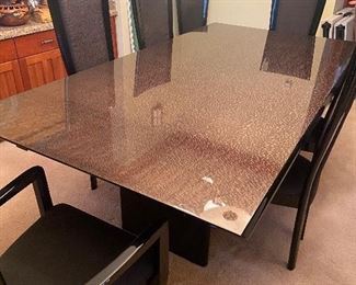 Giorgio Collection dining table and 8 chairs.  Table is 43"w x 84"l x 30.5"h. Sold a a set with the china cabinets in the next photo.  $5200 or best offers will be entertained.  Will consider separating if someone wants just the china cabinets.