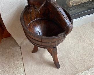 wooden bucket on stand measures 17" in diameter x 29"h 