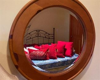 Beveled glass wood framed mirror 26" diameter  $68