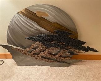 Metal sculpture by Ross Bendixen. 48.5" w x 30'h. $380