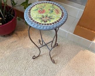 Tile and iron table is 12.5" in diameter and 23"h.  $36