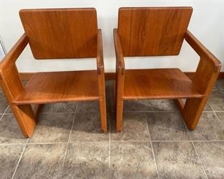 $1000    SET OF 2 MID CENTURY MODERN OAK TILT BACK ARM CHAIRS
The unusual design of these chairs are incredibly rare and unique.  The solid wood frame and Danish modern styling is reminiscent of Milo Baughman. Most likely made in the 1960s or early 1970s. Truly a one-of-a-kind piece of masculine and industrial beauty
DETAILS + DIMENSIONS:
31.5H x 18W x 14D inches 
Seat Height 18"
CONDITION: Please refer to photos for a more detailed look at condition.  We make every attempt to list and photograph any defects or signs of wear that are significant to this sale. 
LOCAL PICK UP MCLEAN, VA.   BUYER IS RESPONSIBLE FOR ANY NECESSARY DISASSEMBLY AND ALL COSTS ASSOCIATED WITH SHIPPING OR PICK UP.  CONTACT US FOR SHIPPING RECOMMENDATIONS.