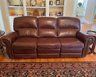 LEATHER MOTORIZED RECLINER BY LEATHER CREATIONS, WALLHUGGER, EXTENDED FOOT REST & MORE.   CRAFTED BY HAND TO LAST A LIFETIME.  NEW COST OVER $4,000. 