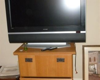 Another TV and lateral file cabinet