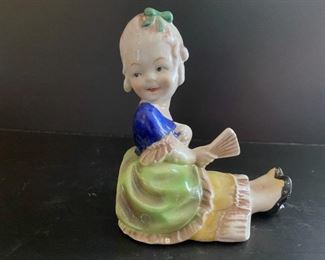 German seated rococo girl figurine