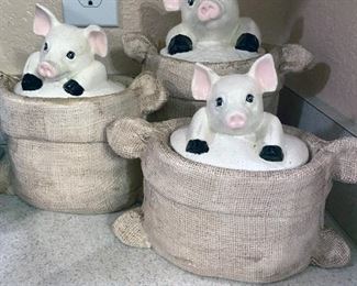 Graduated pig burlap sack ceramic canister set